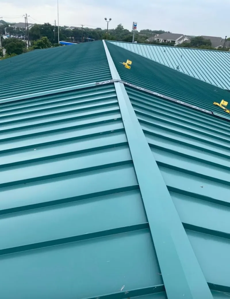 Green commercial metal roof ridge and valley for Metal Roof Repair in Uvalde